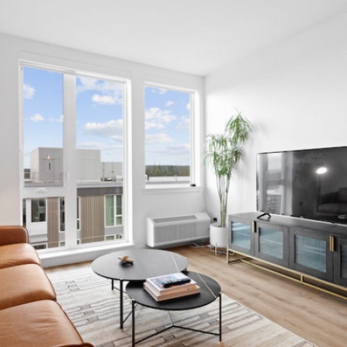 Spacious living room with large windows Spacious living room with large windows